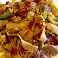 Drunken Noodle · Spicy. Sautéed flat rice noodle with egg, onions, bell peppers, tomatoes, green beans and fr...