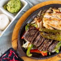 Pollo Y Res · Grilled chicken and beef combo, green and red pepper, onion and corn tortillas.