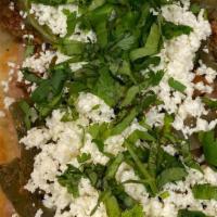 Huaraches · One per order. Thick corn tortilla, beans, lettuce, cheese onion nopales and cream.