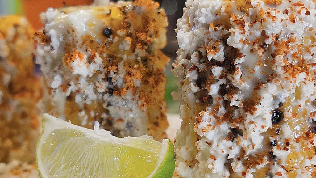 Elotes · Four per order. Corn, mayo, fresh cheese and chile power.