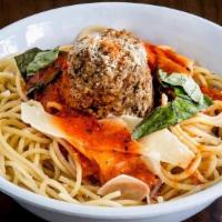 Meatball Parmigiana Pasta · Two pieces fresh meatballs over our home made marinara sauce, fresh basil and shaved Parmesa...