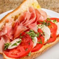 Prosciutto Fresh Mozzarella, Tomato, Basil, Olive Oil, Homemade Bread · 