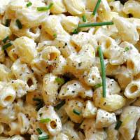 Truffle Mac And Cheese · Classic mac and cheese with truffle oil.