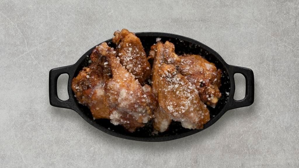Garlic Parmesan Wings · Served with celery or carrots, and blue cheese or ranch.