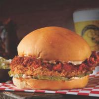 Nashville Hot Sandwich · Our Big Crispy Chicken Breast coated  in our signature Nashville Hot Seasoning, topped with ...