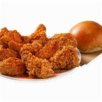 9 Wicked Wings · 9 pc. Wicked Wings dusted with our spicy Lotta Zing® Seasoning • Fresh-Baked Roll