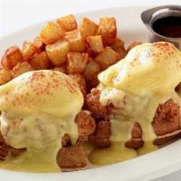 Fried Chicken & Waffles Benedict · Our Belgian Waffle Topped with Crispy Fried Chicken Strips, Poached Eggs and Hollandaise. Se...