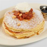 Caramel Apple Pancakes · Buttermilk Pancakes with Glazed Apples, Crispy Caramel Pecans and Chantilly Cream.