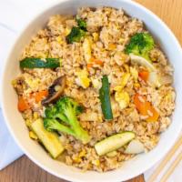 Vegetable Fried Rice · Japanese rice with eggs, broccoli, mushroom, zucchini, carrot and onion.
