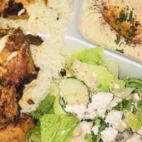 Chicken Kabob · Grilled marinated and seasoned thick cuts of chicken.