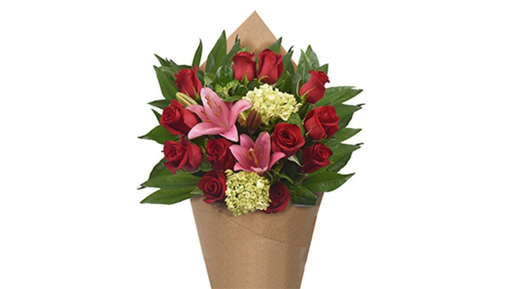 Bloom Haus 12 Plus Rose Bouquet - Red · Traditional tokens of true love, long-stemmed red roses combine graciously with lush garden blossoms, pert foliage and delicate fillers. This elegant mixed bouquet looks just as good in a vase as it does wrapped for presentation!