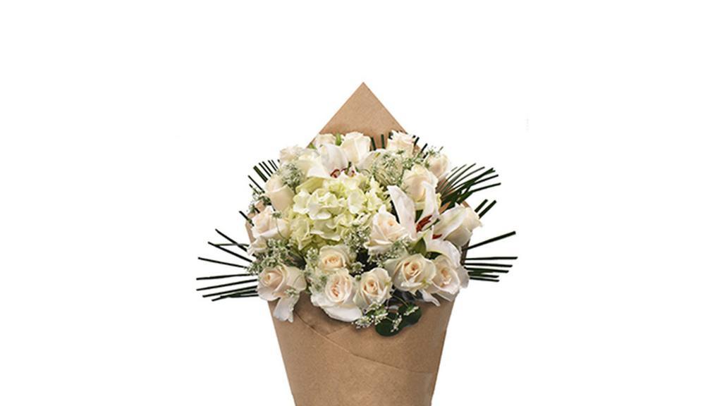 Bloom Haus 18 Plus Rose Bouquet - White · Monochromatic white blossoms are as timeless as they are elegant.  Dreamy marshmallow white roses,  hydrangea and lilies surrounded by crisp greens,  all decoratively wrapped sends a message of sophistication and admiration.