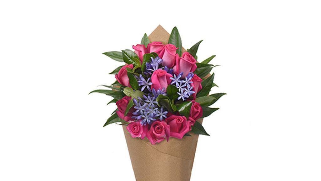 Bloom Haus 12 Plus Rose Bouquet - Pink · Bold and beautiful, these hot pink varieties represent roses at their most fashionable. Supplementing their stylish presence, agapanthus makes for a vivid combination that is both contemporary and classic.