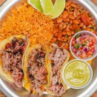 Brisket Taco Plate · 3 mini corn tortillas with Shredded Cheese and Brisket. Served with a side of Charro beans, ...