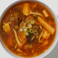 Hot And Sour Soup · Szechuan classic chicken broth with tofu and egg.