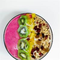Tropical Pitaya · Base: Pitaya
Toppings: Pinapple, banana, kiwi, granola, raisin mix, goji berries, shredded c...