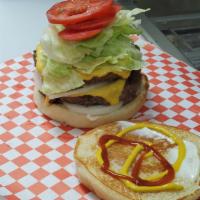 Big Tx Burger · Double Large patty with Double Real American Cheese, pickle, lettuce, tomato, fresh onion sl...