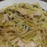 Chicken Piccata · Chicken with lemon sauce and capers served over capellini.