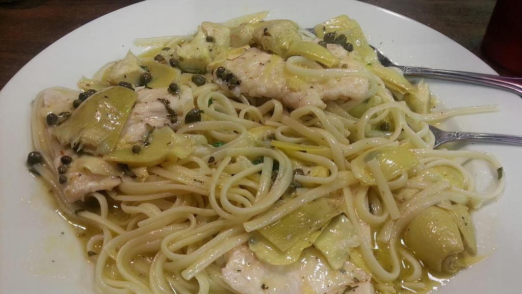 Chicken Piccata · Chicken with lemon sauce and capers served over capellini.