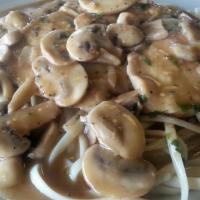 Chicken Marsala · With sauteed mushrooms in a marsala wine sauce.
