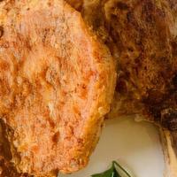 Fried Pork Chop Plate · 2 CRISPY SOUTHERN FRIED PORK CHOPS WITH YOUR CHOICE OF 2 SIDES