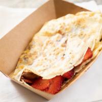 L Woods Crepe · Strawberry compote, Nutella, topped off with powdered sugar or whip cream.