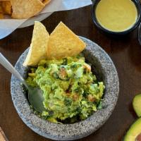 Guacamole · Fresh hass avocados, cilantro and lime. Served with fresh chips and salsa.