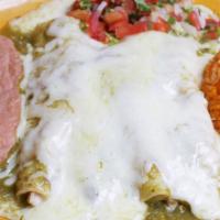 Enchiladas Verdes · Homemade corn tortillas filled with your choice of meat, topped with Monterey jack cheese an...