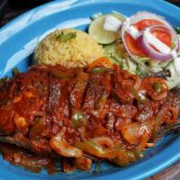 Mojarra Ala Diabla · Spicy chipotle onions and tomato, served with salad and rice.