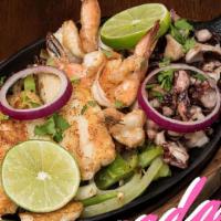 Mariscada Parrillada · Grilled octopus, shrimp, and tilapia served with Spanish rice, charro beans, pico de gallo, ...