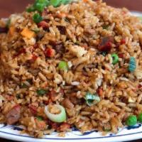 House Special Fried Rice · House special stir-fried rice with chicken shrimp and pork.