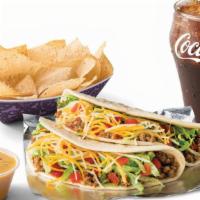 Ground Beef Taco Combo · Two Ground Beef Tacos, chips & queso and a 20 oz. drink.