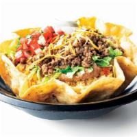 Cabana Bowl™ With Crispy Shell · Served with rice, beans, shredded lettuce, pico de gallo, shredded cheese and sour cream