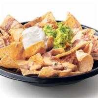 Bean & Cheese Nachos · Refried beans, queso and crispy tortilla chips with a side of sour cream & guacamole