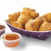 Large Sopapillas · Served with honey or Dulce de Leche