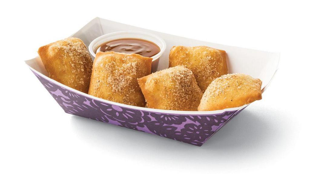 Small Sopapillas · Served with honey or Dulce de Leche