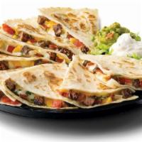 Steak Fajita Quesadillas · Two flour tortillas filled with melted Jack & Cheddar cheeses & pico de gallo served with a ...