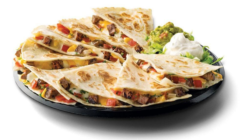 Steak Fajita Quesadillas · Two flour tortillas filled with melted Jack & Cheddar cheeses & pico de gallo served with a side of sour cream & guacamole