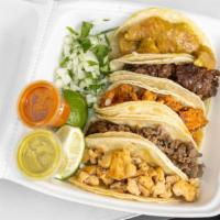 4 Tacos · Your choice of meat with the side of rice & bean