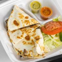 Quesadilla  · your Choice of meat  with side of rice and Bean.