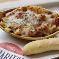 Baked Ziti · Fresh ziti, mixed with marinara and Ricotta cheese. Topped with four cheese blend, and serve...