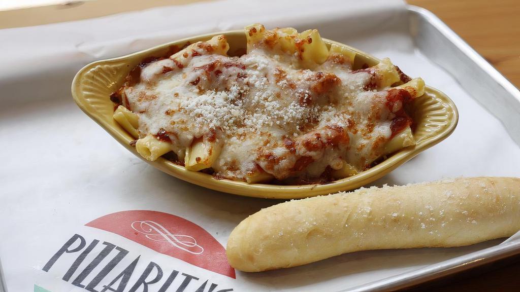 Baked Ziti · Fresh ziti, mixed with marinara and Ricotta cheese. Topped with four cheese blend, and served with a buttery bread stick.