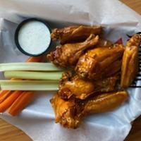 10 Traditional Wings · Bone in wings tossed in your favorite sauce. Served with celery & carrots. Your choice of dr...