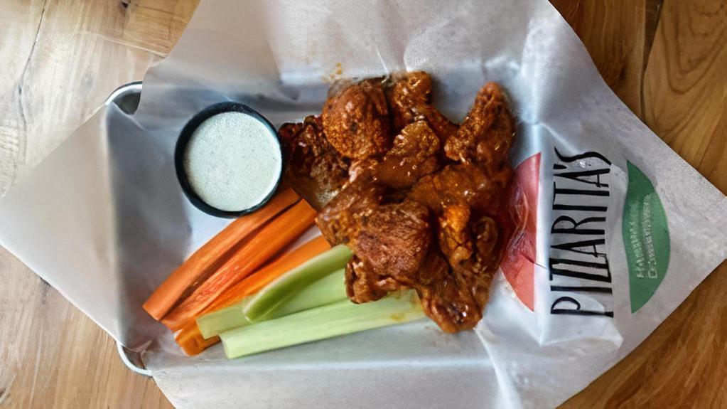 10 Boneless Wings · Boneless Wings tossed in your favorite sauce. Served with celery & carrots. Your choice of dressing.