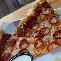 The Gameday Combo · Two slices of either Cheese or Pepeproni Pizza, served with 5 BONELESS wings and a fountain ...