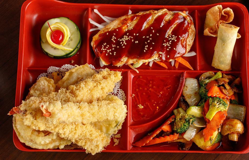 Salmon · Served with onion soup salad teppanyaki vegetables shrimp tempura crab meat puff and harumaki.