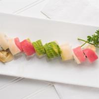 Triple Tuna Roll · White tuna, snow crab, masago inside topped with tuna, super white tuna and avocado.