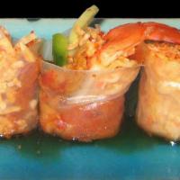 Tsunami Roll · Spicy crawfish, spicy tuna, shrimp, jalapeño, snow crab, cucumber, spicy ponzu sauce, rice p...