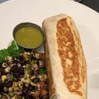 Burrito Encanto · Mexican Rice, refried beans, white cheese, shredded lettuce, diced tomato, guacamole, sour c...