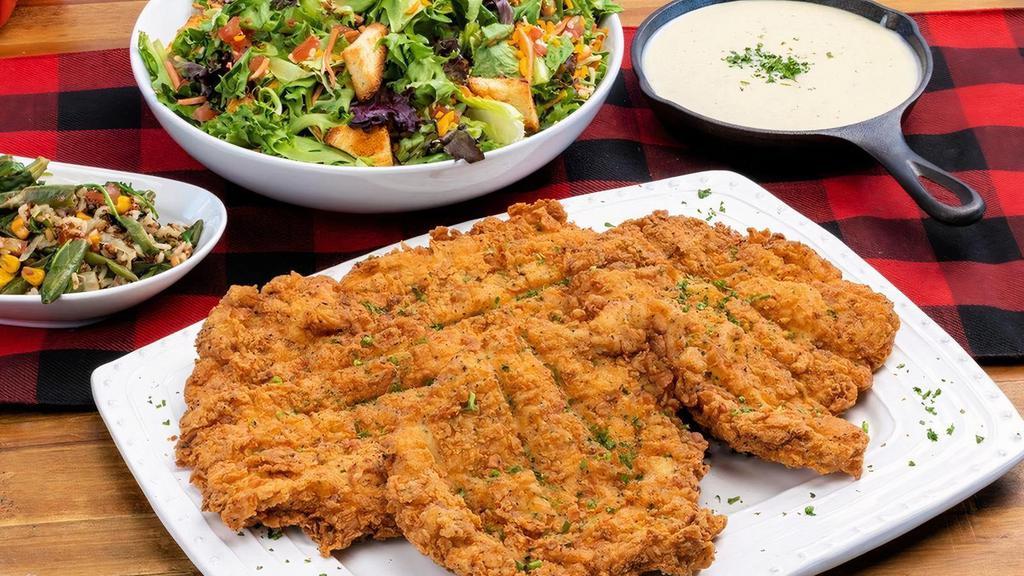 Chicken Fried Chicken ~ Party Pack  · four fried chicken breasts · jalapeño gravy · choice of four individual sides · family size House Salad · six dinner rolls with butter · feeds a party of 4